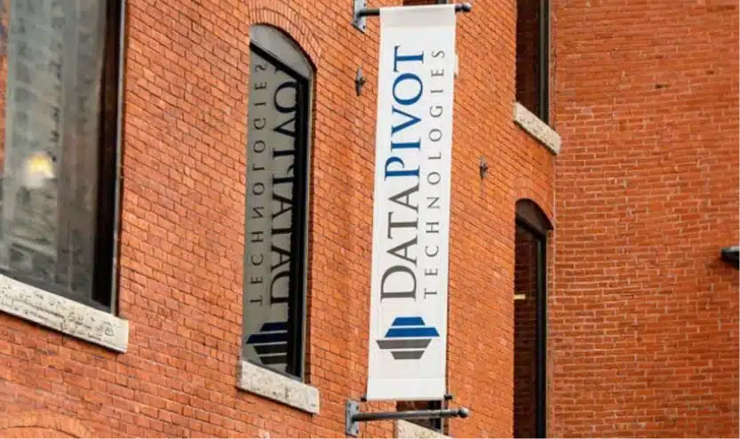 DataPivot Technologies sign displayed on the exterior of a historic brick office building