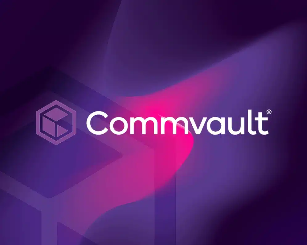 Commvault logo displayed prominently on a vivid purple and pink abstract gradient background design